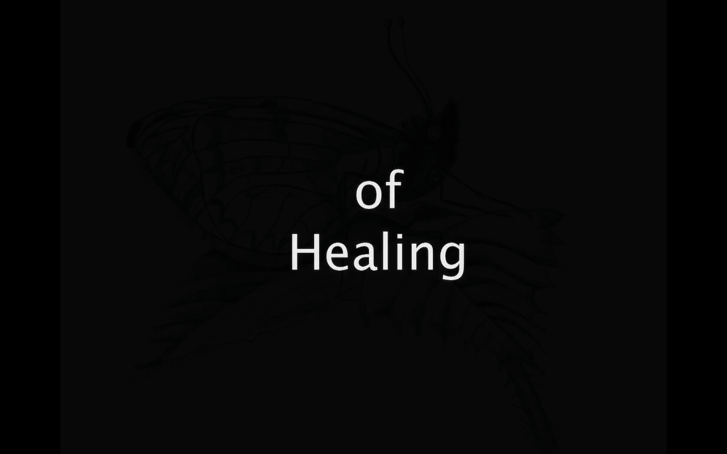 'Of Healing' text black ground with white text.